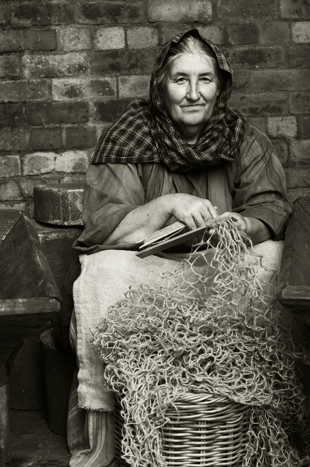 3rd Place - Repairing Nets by Janet Webb